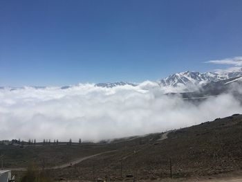 View of landscape against cloudy sky