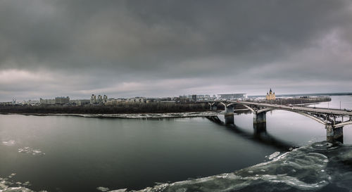 Bridge over river against sky