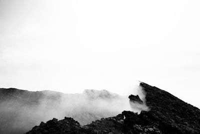 Scenic view of mountains against clear sky