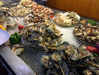 Oysters in plates on table