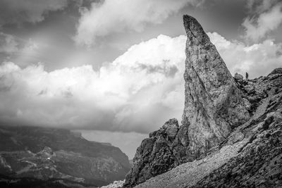 Low angle view of rock formations against sky