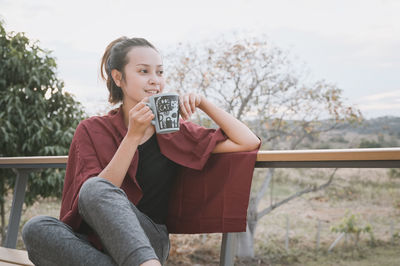 Series photo of young woman hand holding ceramic mug, positive emotion, chill and joyful