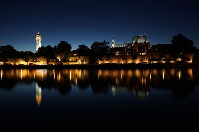 Reflection of illuminated buildings in water