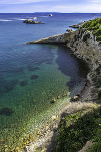 High angle view of sea shore against sky
