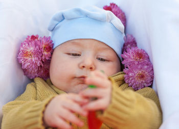 Close-up portrait of cute girl eating food