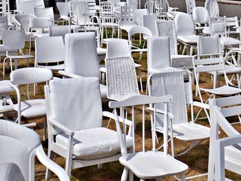 Empty chairs and tables at cafe