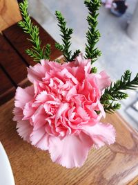 Close-up of pink flowers on table