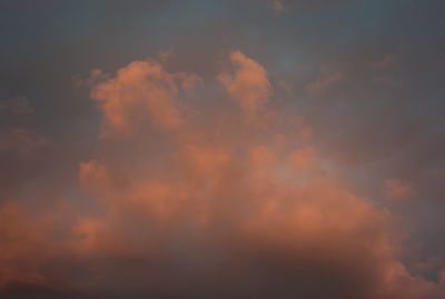 Low angle view of dramatic sky during sunset