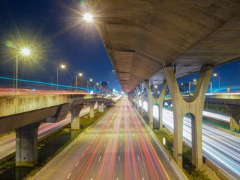 Light trails on elevated road at night