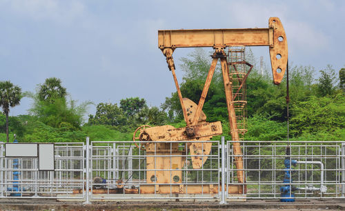 View of old construction site against sky