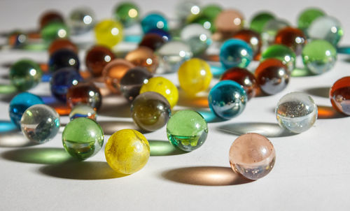 Close-up of multi colored balls on table