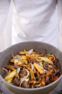 High angle view of meat in cooking pan