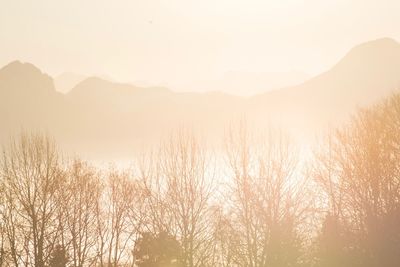 Scenic view of silhouette mountains against clear sky