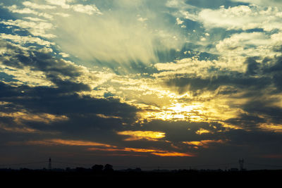 Low angle view of dramatic sky during sunset