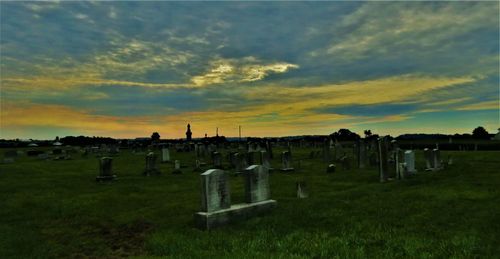 View of cemetery against sky during sunset