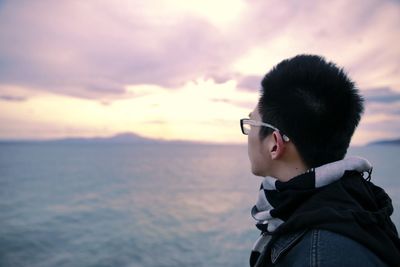 Woman looking at sunset