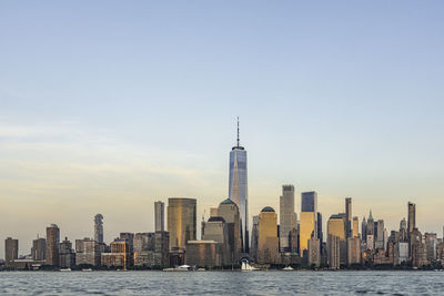 Modern buildings in city against sky