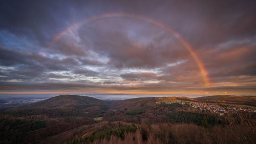 Sunrise with beautiful rainbow near freiolsheim in the northern black forest