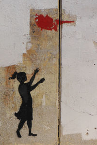 Shadow of man on wall