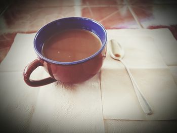 High angle view of coffee cup on table
