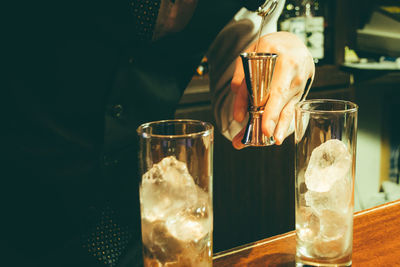 Close-up of beer glass on table