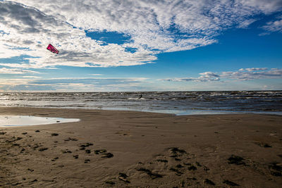 Scenic view of beach against sky