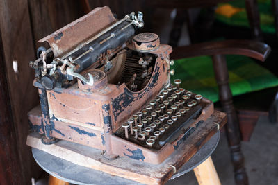 High angle view of old machinery on table