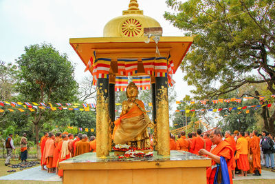 Statue of temple against trees