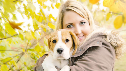 Portrait of woman with dog