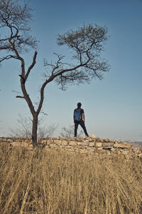 Full length of man on field against sky