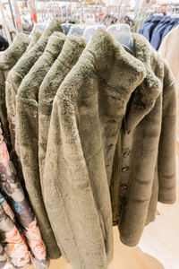 Close-up of clothes hanging on display at store