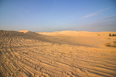 Scenic view of desert against sky