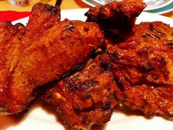 Close-up of meat on barbecue