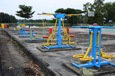 View of playground against blue sky