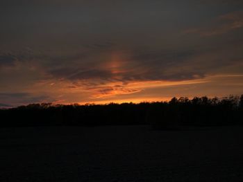 Scenic view of silhouette trees against sky during sunset