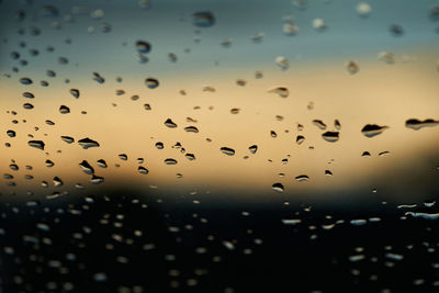 Full frame shot of wet glass window