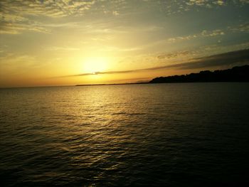 Scenic view of sea at sunset