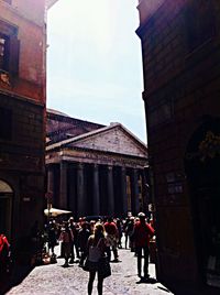 Tourists in front of building