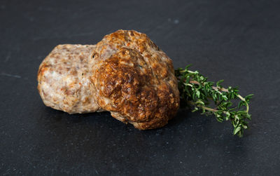 Close-up of meat against black background