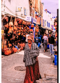 People standing on street market