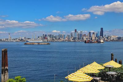 Scenic view of seattle and buildings against sky