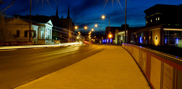 Surface level of illuminated street at night