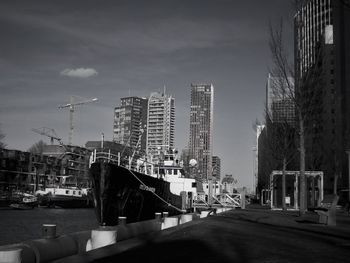 Modern buildings in city against sky