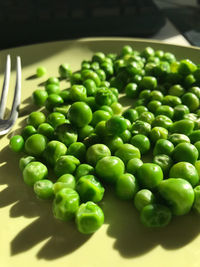 High angle view of green fruits on table