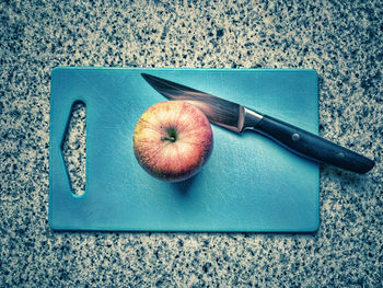 High angle view of apple and fruits on table