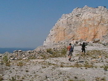 Woman standing on rock formation