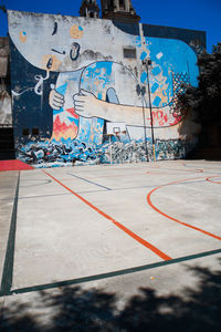 View of basketball hoop on city street