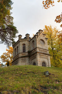 Low angle view of historic building against sky