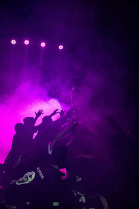 Silhouette crowd at music concert