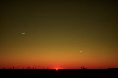 Scenic view of silhouette landscape against sky during sunset